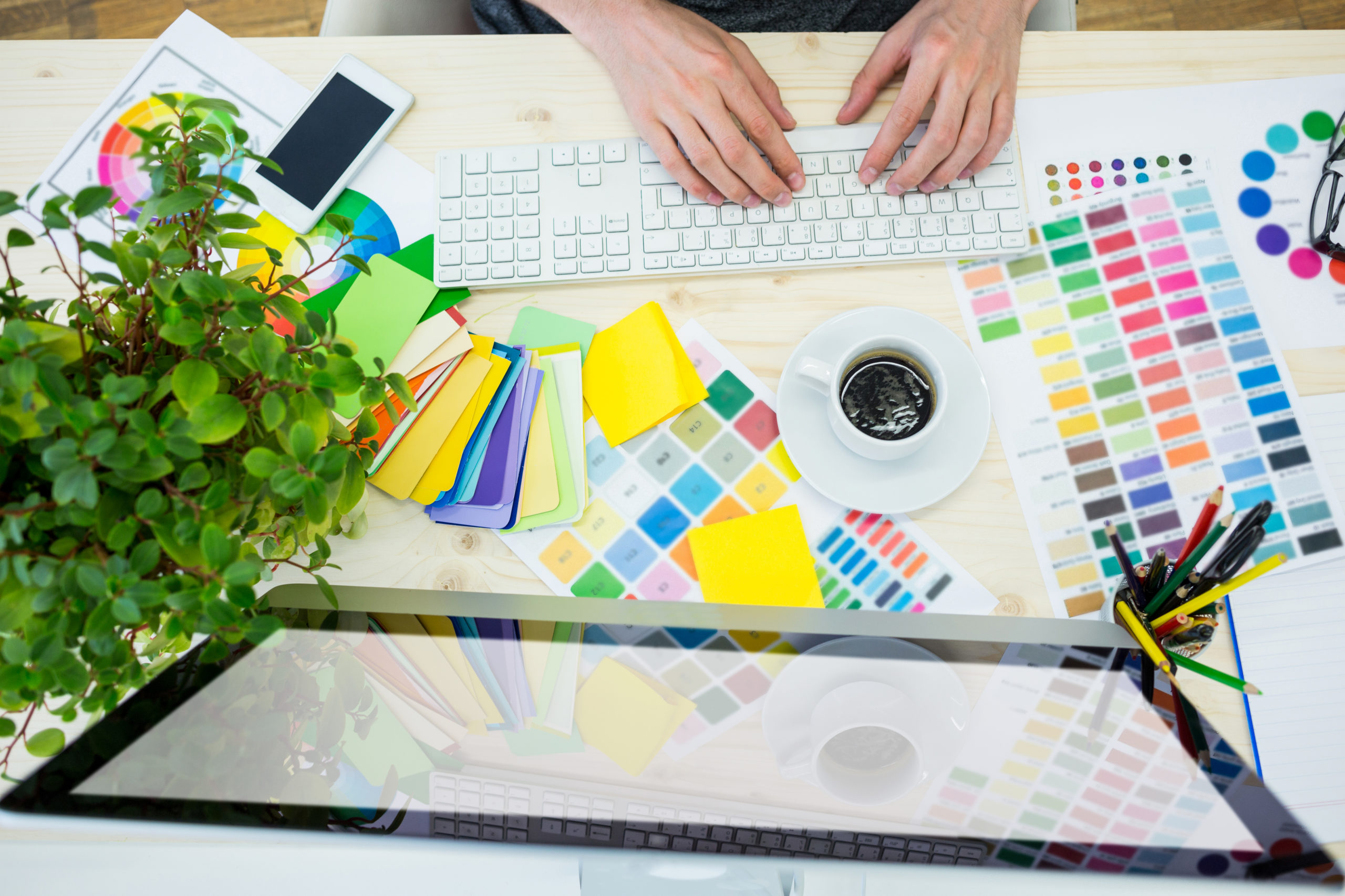 Hands of graphic designers using laptop